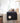 my hand in your™ black Fleece Blanket folded on a couch - Holiday and birthday gift ideas for friends and family
