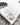 MHIY™ White Fleece-Lined Winter Beanie pictured on top of a scarf and gloves – winter gifts that help you stay warm provided by My Hand In Yours